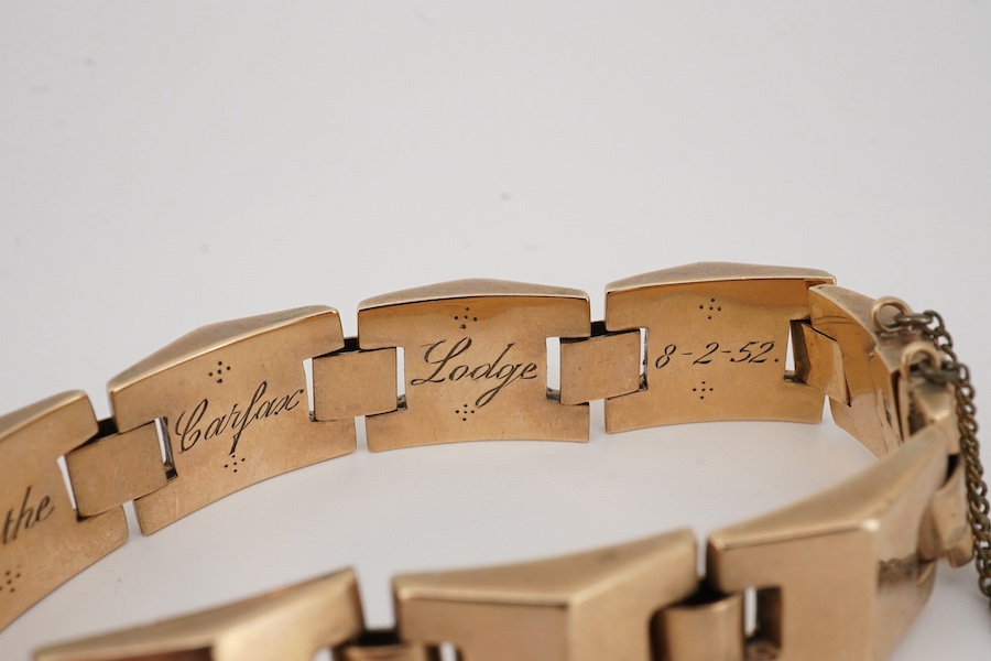 A 9ct shaped link bracelet, with engraved Masonic related inscription, 18cm, 23.7 grams. Condition - fair